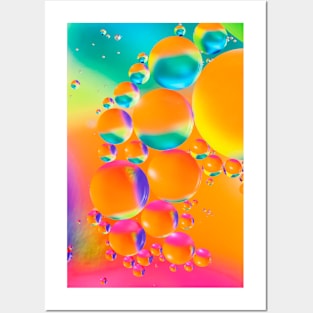 Colorful close up of oil drops in water Posters and Art